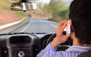 driving while holding a mobile phone