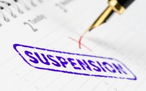 how to suspend an employee on full pay
